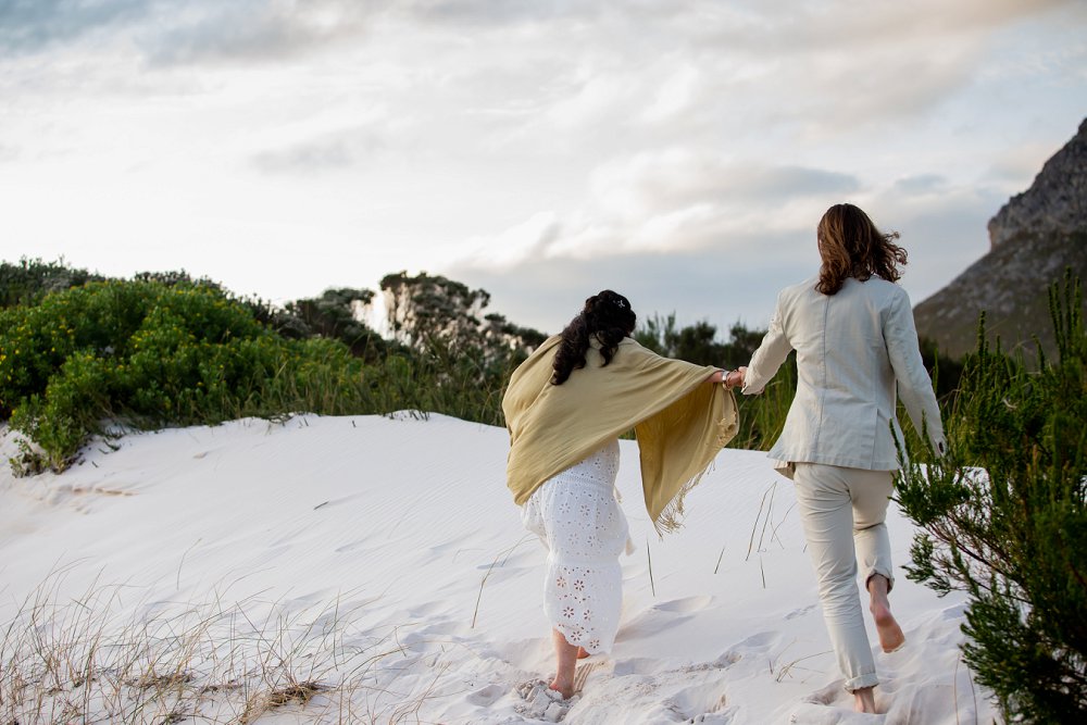 intimate beach wedding couple on dunes
