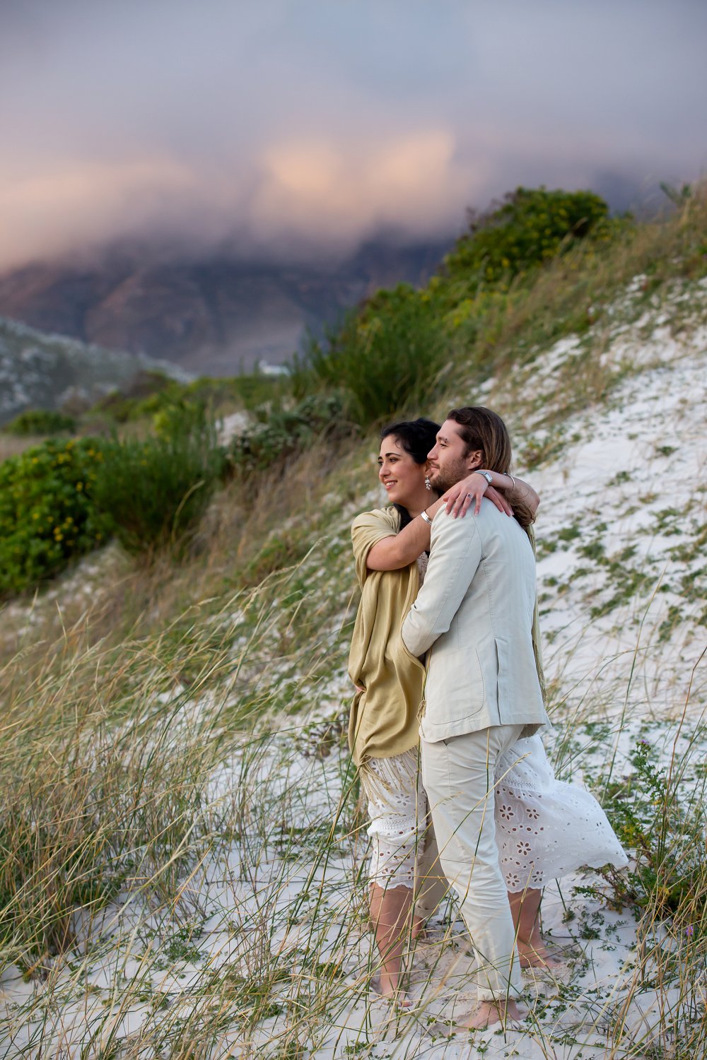 intimate beach wedding couple on dunes