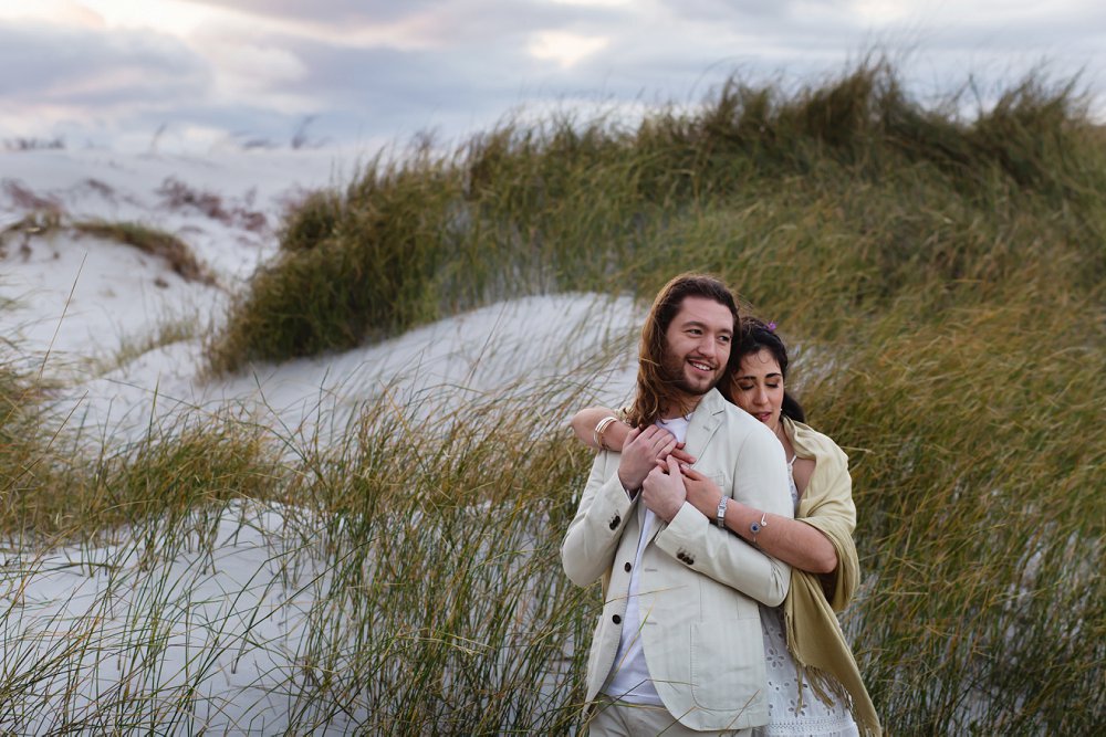 intimate beach wedding couple on dunes