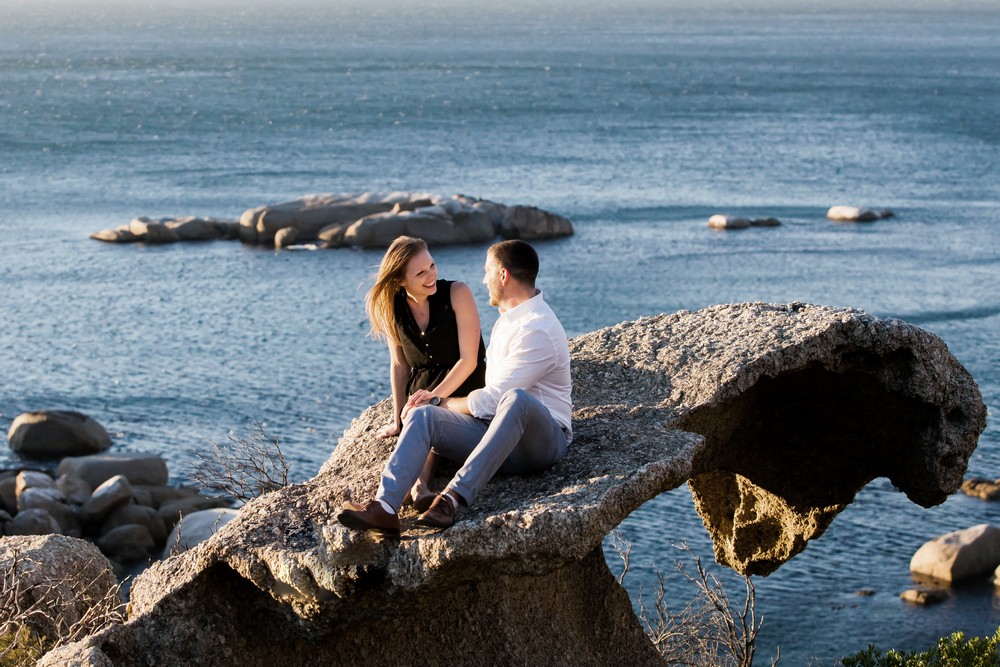 Cape Town proposal photography couple on Stanley rock with epic sea views